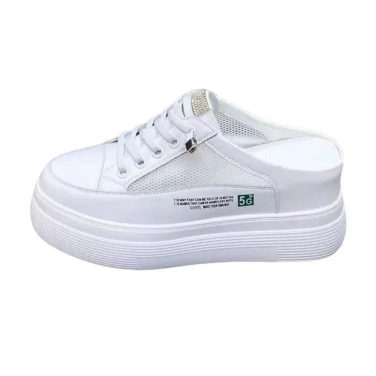 White women's casual platform shoes with mesh surface and heel-free design on a rubber sole.