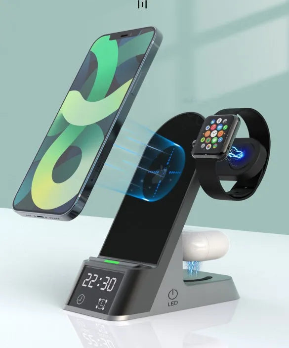 Black six-in-one alarm clock and wireless charging station on a desk.