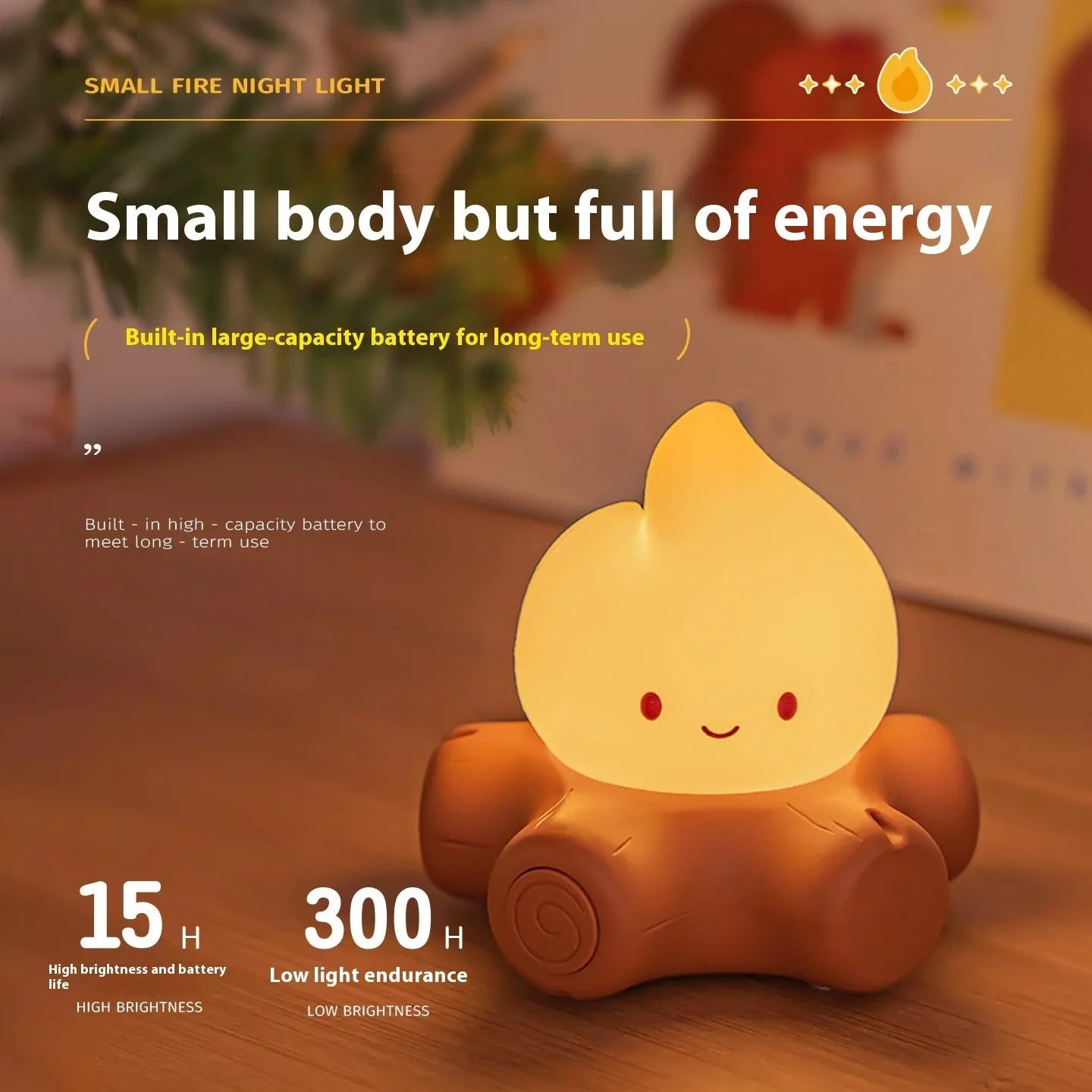 Small cartoon silicone fire pile night lamp with warm yellow lighting on wooden surface