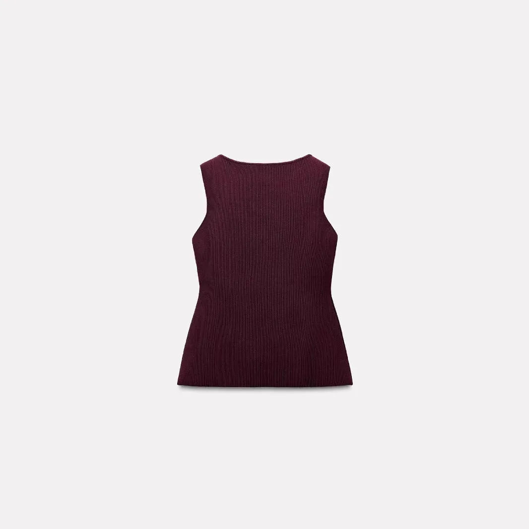 Slim fit dark red viscose sweater vest with a textured 3D pattern, shown on a model.