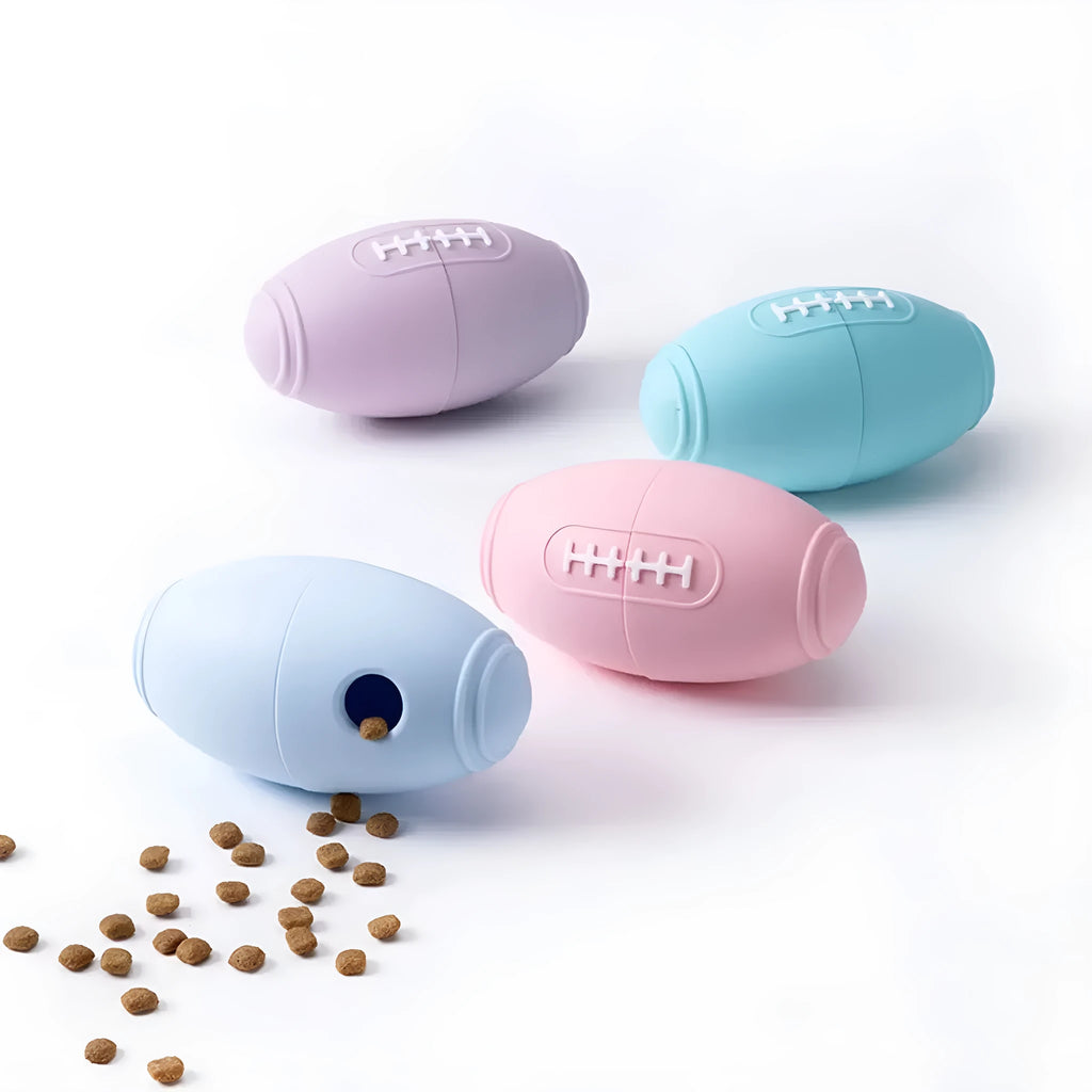Silicone rugby ball dog toy with treat holes in blue colour