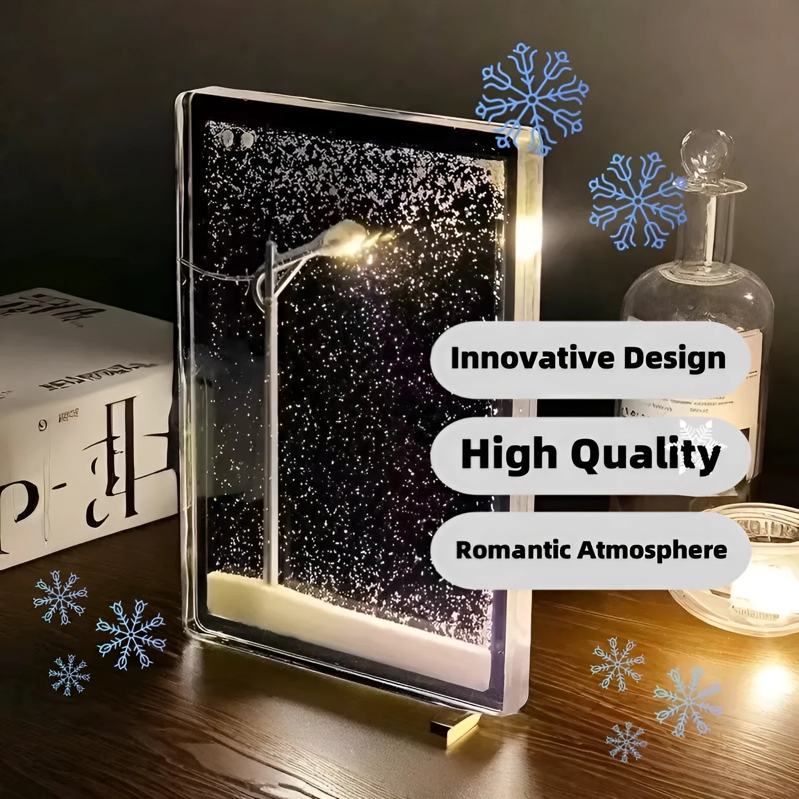 DIY kit for assembling a snowy landscape night light with LED effects on a desktop.