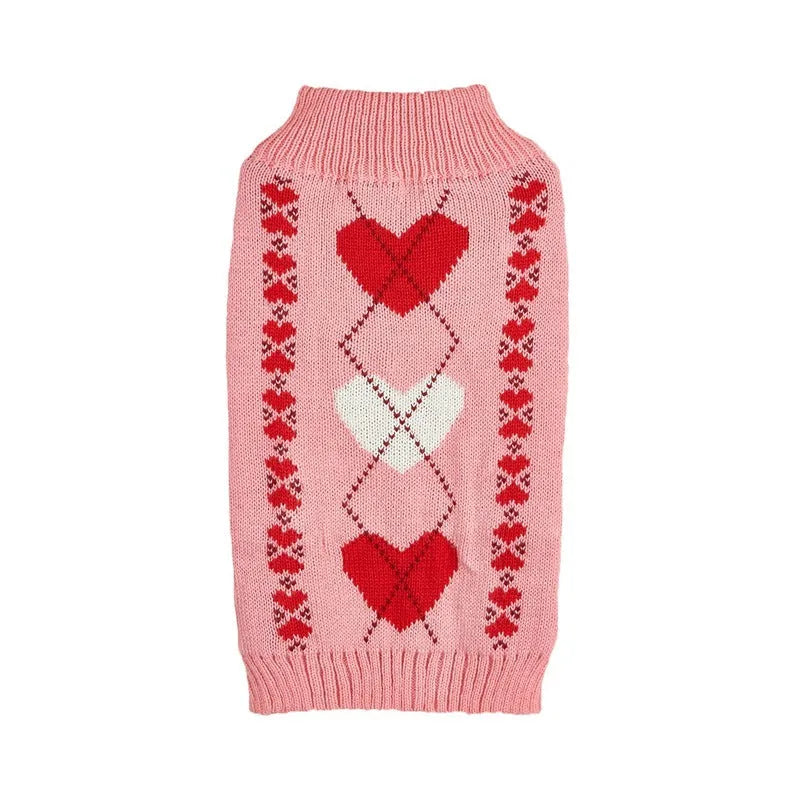 Red love heart design dog sweater on a small dog, showing acrylic knit and appliqué detail.