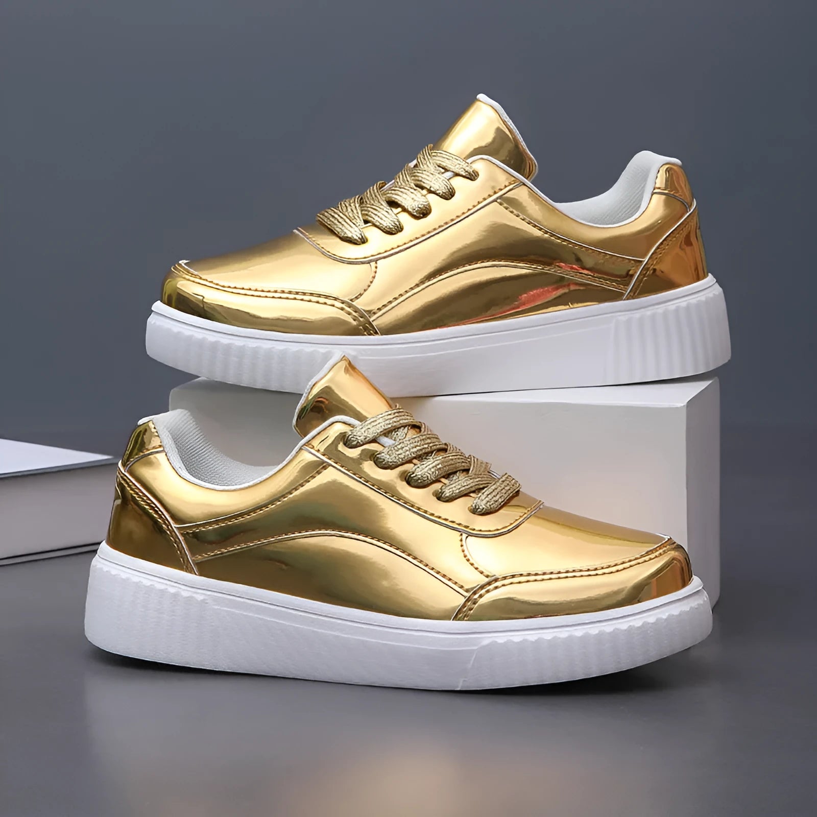 Rose gold sequin platform sneakers with round toe and thick sole.