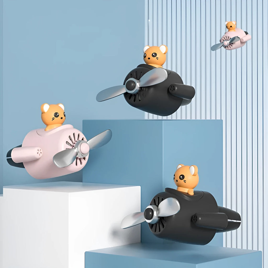 Cartoon airplane-shaped plastic car air vent aromatherapy clip in four colour options with fragrant slices.