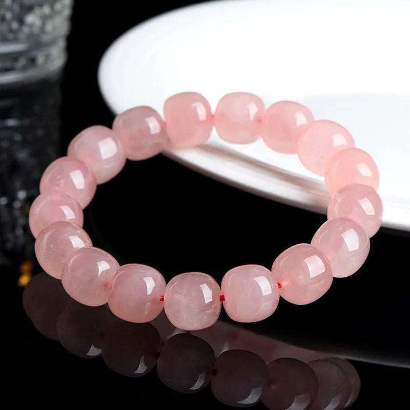 Pink barrel-shaped crystal bead bracelet with geometric 8-10mm beads