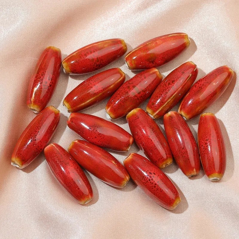 Ceramic bullet beads in seven colours for jewellery making and bracelet braiding