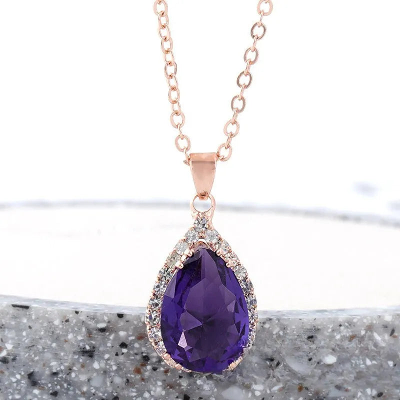 Rose gold water drop shaped women's necklace with geometric rhinestone decoration in pink colour