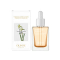 30ml glass bottle of brightening and firming facial oil with vitamin E and tuberose extract