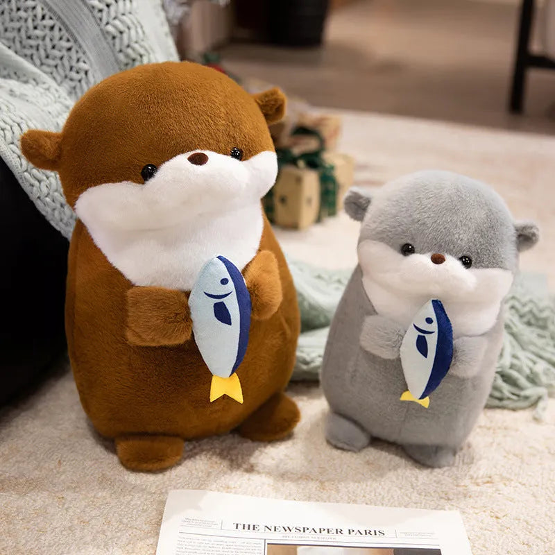 Small otter plush doll holding a fish in short plush fabric, available in brown and gray, 30cm or 40cm height