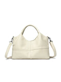 Soft leather crossbody handbag in black, bucket shape with single shoulder strap, lightweight design for women