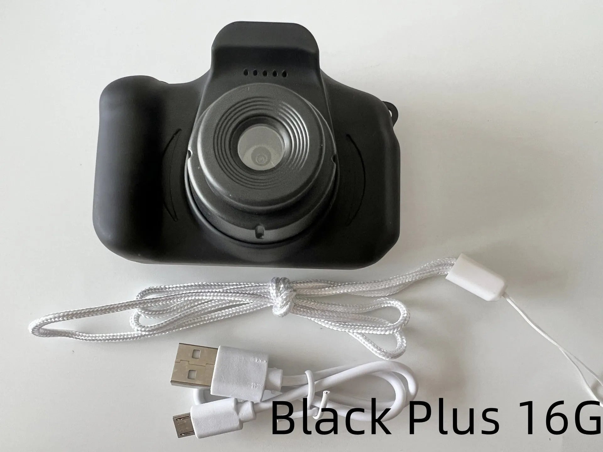 X2 HD mini cartoon kids digital camera in silicone body with 2-inch screen and lanyard.