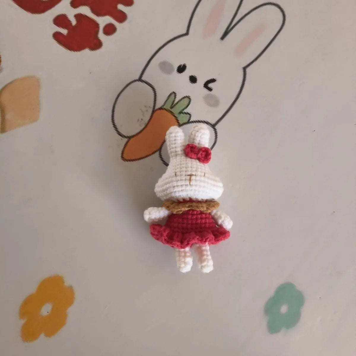 Hand-crocheted wool rabbit pendant accessory with key chain attachment option
