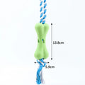 Green porous bone rope knot dog chewing toy for stuffing with treats