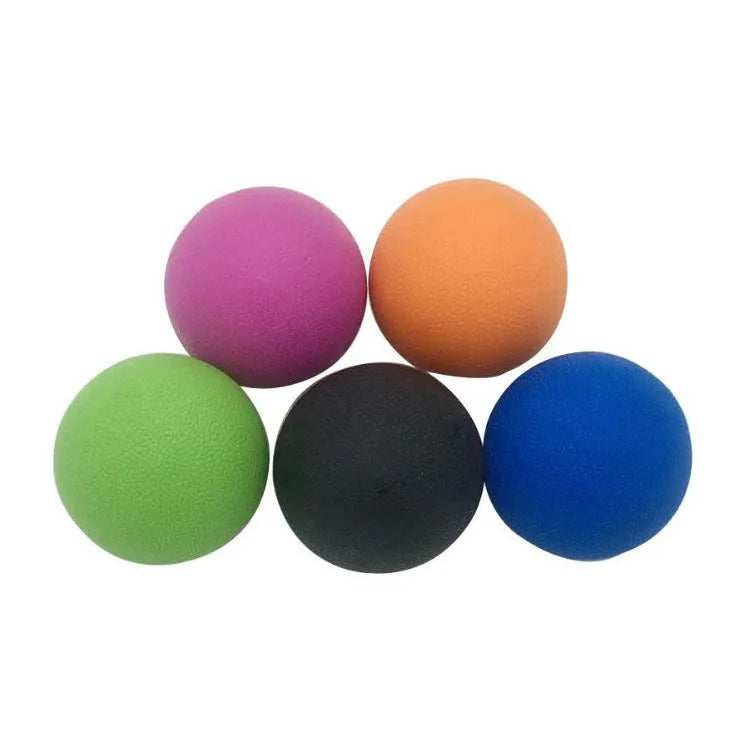 Green TPE yoga massage ball with 6.1 cm diameter on a plain background.