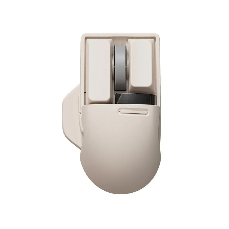 Tofu coloured Xiaoqiao wireless mouse on a desk, showing its ergonomic shape and seven buttons.