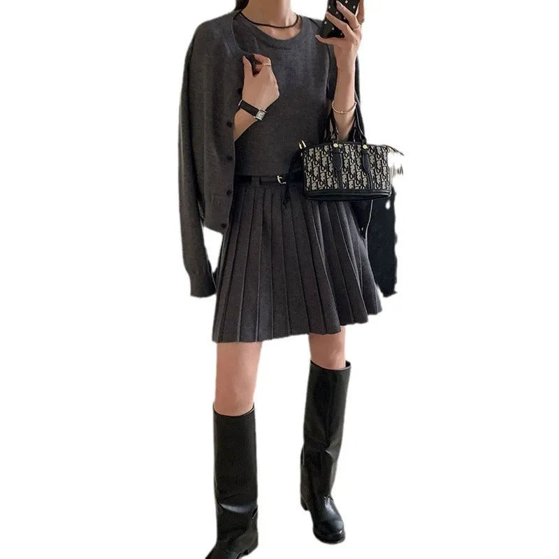 Women's grey art retro knitted cardigan and pleated vest skirt two-piece set.