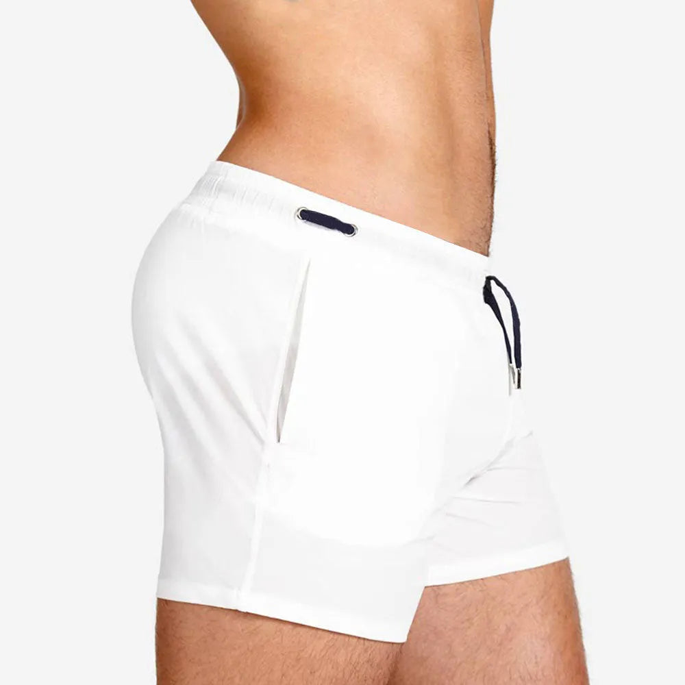 Mesh-lined sports shorts in polyester fabric showing colour options