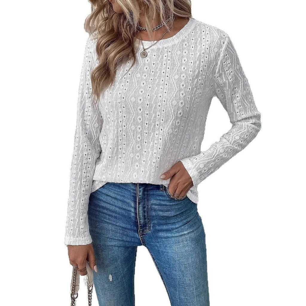 White loose-fit round neck long sleeve polyester t-shirt laid flat.