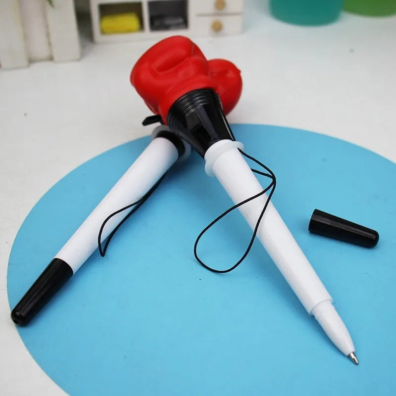 Four black pressure relief ejection pens with a plug-in sleeve fidget mechanism and 0.7mm bullet tips.