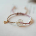 Women's crystal bracelet with vintage weaving and flower-shaped chamfered crystals on rope strap