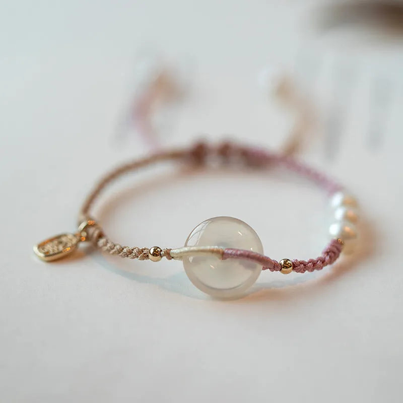 Women's crystal bracelet with vintage weaving and flower-shaped chamfered crystals on rope strap