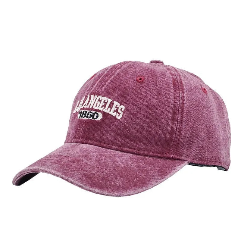Retro washed distressed personalised embroidered peaked cap in acrylic fabric, shown on a mannequin.
