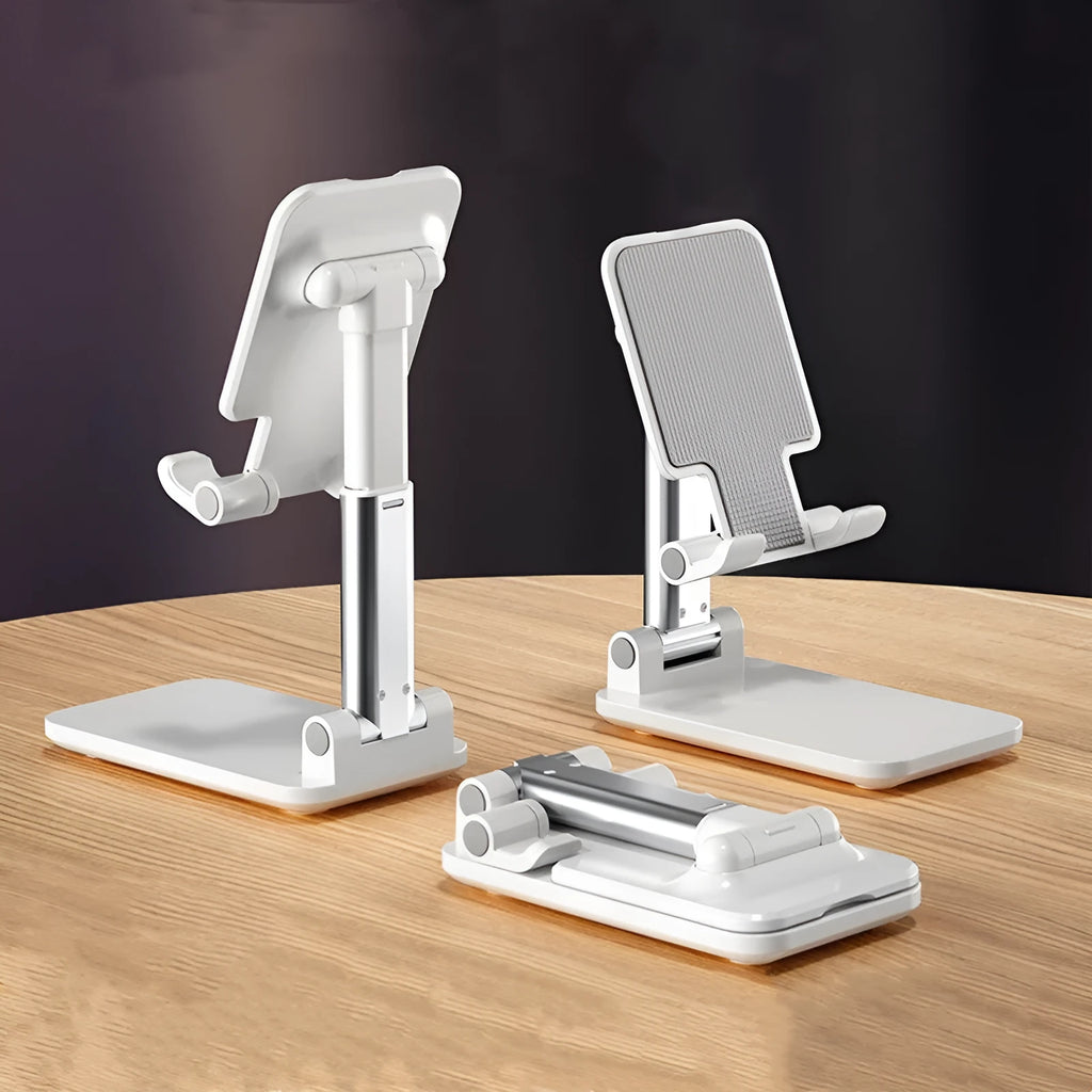 Folding telescopic mobile phone bracket in blue on a desktop, holding a smartphone securely with its silicone pad.