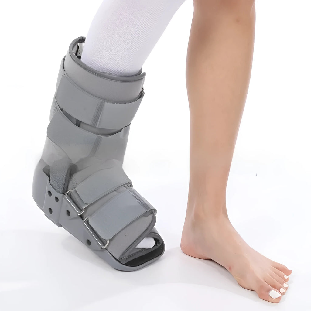 Grey and black Achilles tendon rehabilitation walking aid boot with straps, shown in sizes S, M, L, XL.