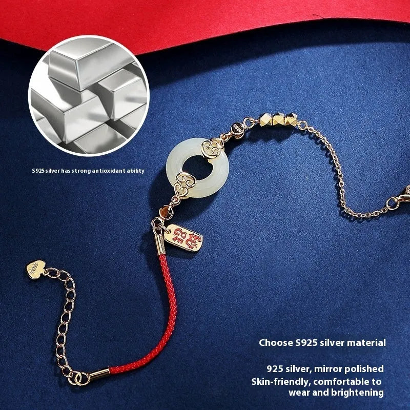Chinese style sterling silver jewellery set showing gourd bracelet, Fu character necklace, and earrings with Hetian jade inlay.