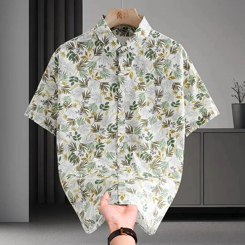Men's floral printed cotton Hawaiian shirt in a casual cardigan style on a hanger.