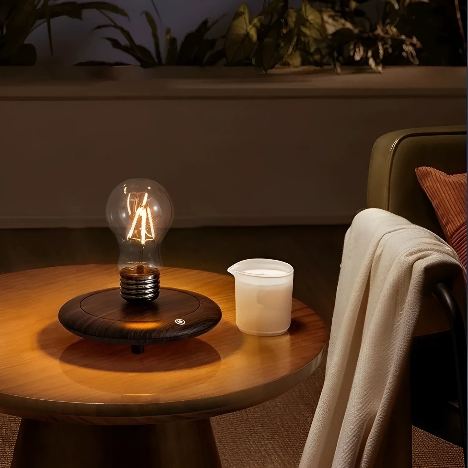 Small black suspension bulb night lamp with iron art body on a wood grain base for desktop decoration.
