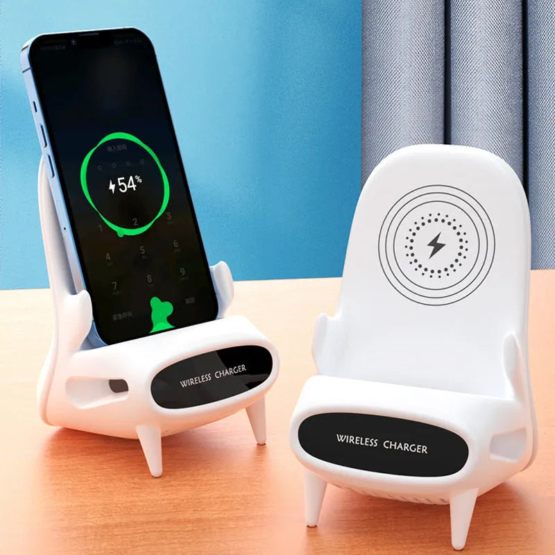 White mini chair shaped wireless charging stand holding a mobile phone at an angle
