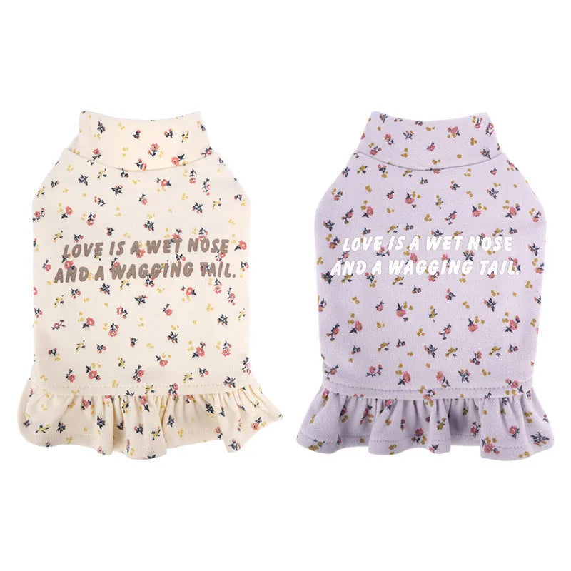 Bichon Frise dog wearing light purple floral undershirt skirt pet clothing