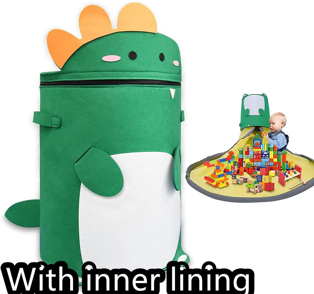 Green felt cube-shaped toy storage bag opened flat as a play mat next to toys, showing pull rope.