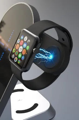 Black six-in-one alarm clock and wireless charging station on a desk.