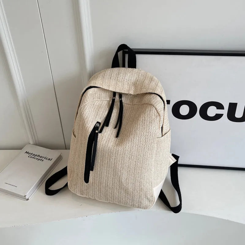 Minimalist waterproof polyester backpack in black with internal phone pocket and urban simplicity design
