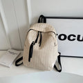Minimalist waterproof polyester backpack in black with internal phone pocket and urban simplicity design
