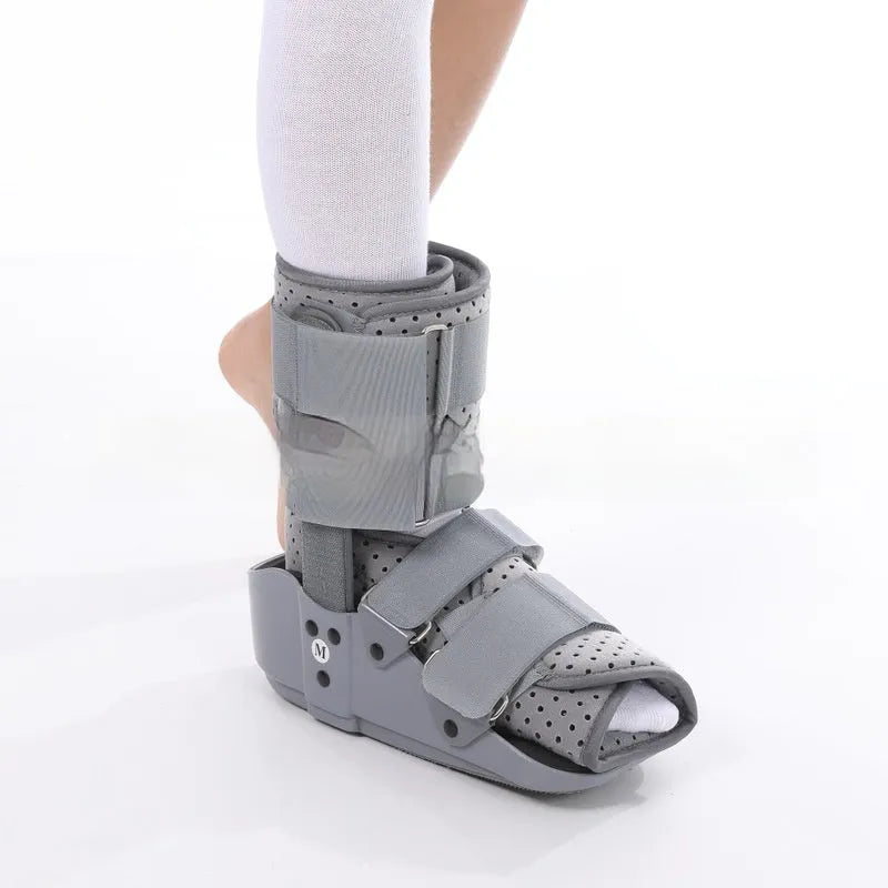 Grey and black Achilles tendon rehabilitation walking aid boot with straps, shown in sizes S, M, L, XL.