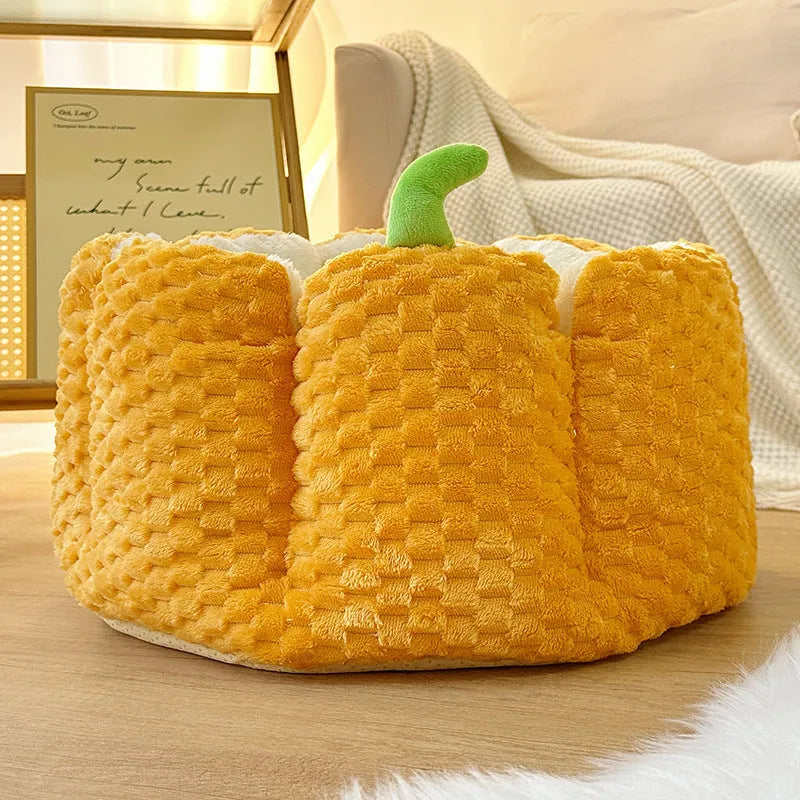 Pumpkin-shaped pet bed with raised sides and cotton filling for cats and small dogs
