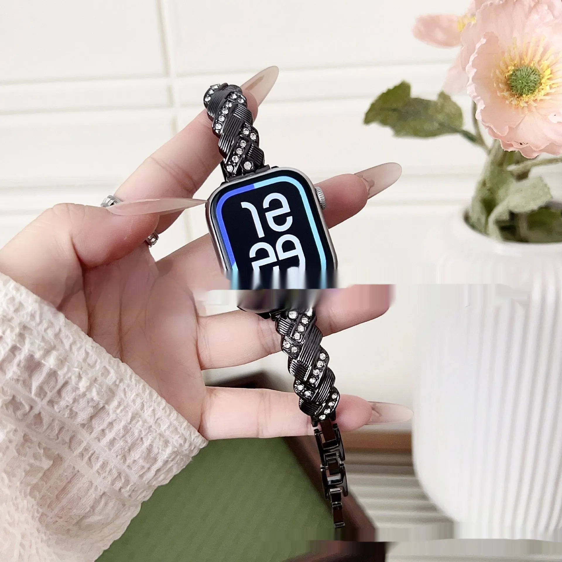 Zinc alloy metal twist design strap for Apple Watch in silver, rose gold, gold, black and starlight colours.