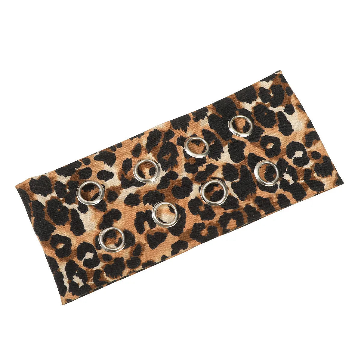 A black polyester exercise hair band with a hollow metal decorative centrepiece.