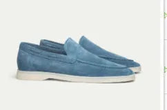 Men's matte suede flat shoes in sky blue with round toe and rubber sole on a plain background