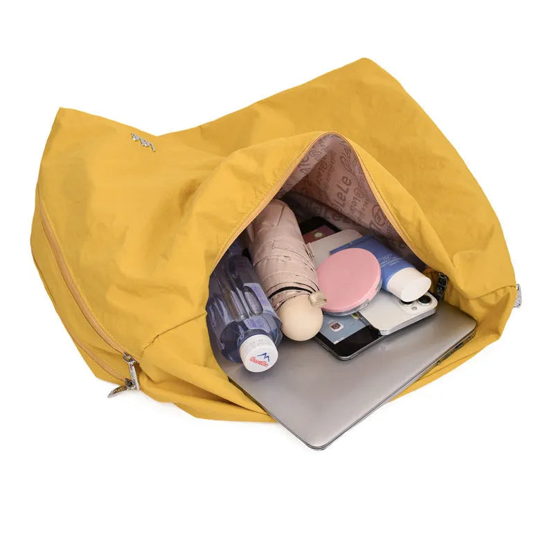 Women's heart-shaped nylon underarm bag in black, yellow, khaki, or blue colours with large capacity