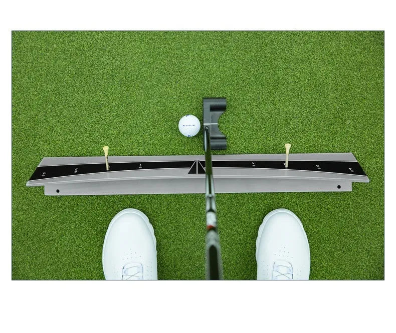 Adjustable golf putter trajectory balance simulator with push rod balancer on a flat surface.