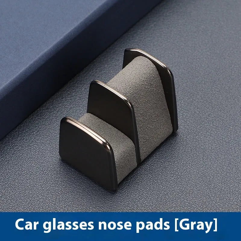 Zinc alloy car dashboard sunglasses holder with leather strap in black, green, grey, or red.