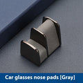 Zinc alloy car dashboard sunglasses holder with leather strap in black, green, grey, or red.