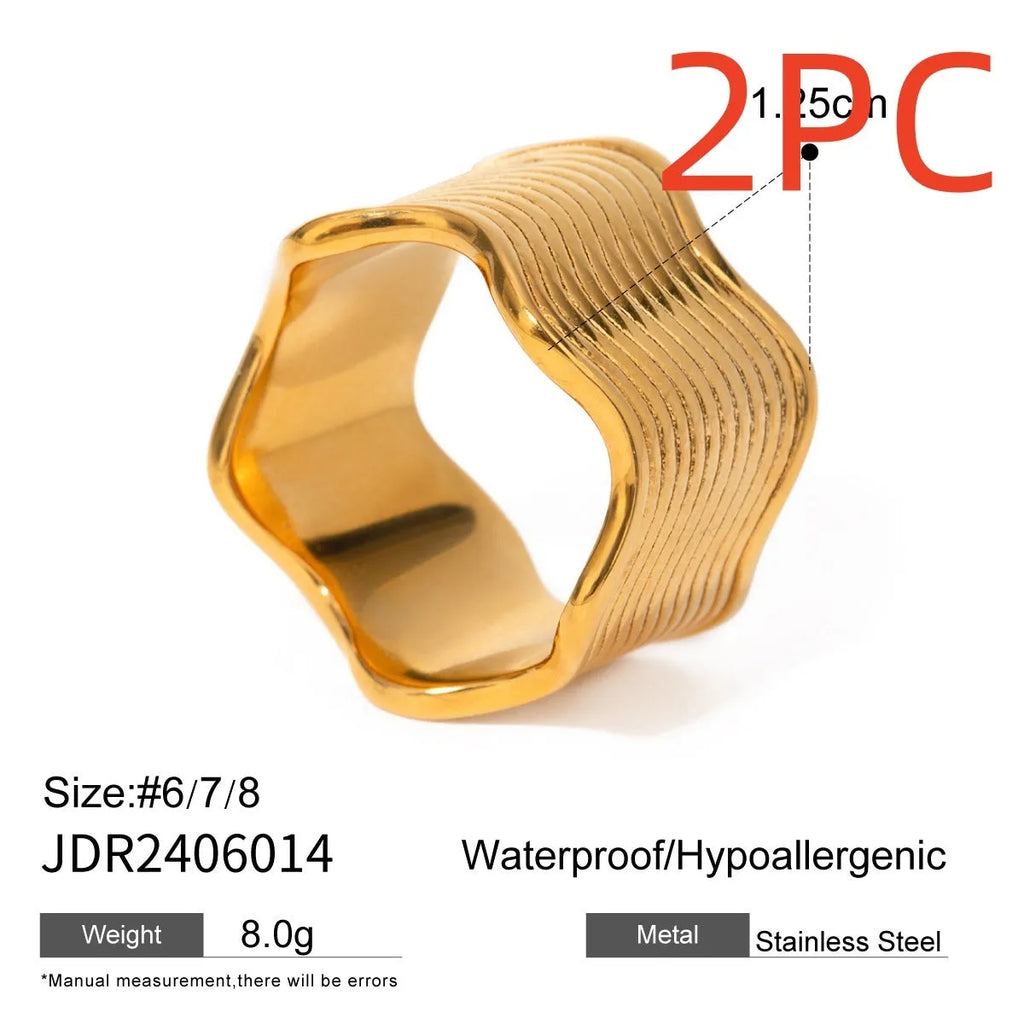 Women's stainless steel geometric ring with wide wave design in electroplated colours