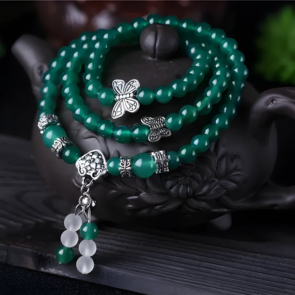 Green multi-layer agate bracelet with three strands of hand-made 6mm beads.