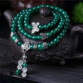 Green multi-layer agate bracelet with three strands of hand-made 6mm beads.